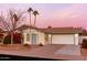 Charming single-story home with desert landscaping, garage, and inviting entrance at 2907 S Elm St, Tempe, AZ 85282