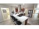Stylish kitchen features stainless steel appliances, breakfast bar, dark cabinets, and stone countertops at 2907 S Elm St, Tempe, AZ 85282