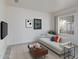 Cozy living room features a comfortable sofa, large window, and stylish decor at 2907 S Elm St, Tempe, AZ 85282