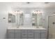 Bright bathroom features double sinks, modern fixtures, and a walk-in shower at 3555 E Erie St, Gilbert, AZ 85295