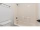 Clean and well-maintained bathroom showcasing a white bathtub and shower with tiled walls at 3555 E Erie St, Gilbert, AZ 85295