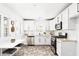 Modern kitchen with stainless steel appliances, white cabinetry, and a bright, airy feel at 3555 E Erie St, Gilbert, AZ 85295