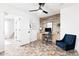 Cozy home office featuring a wood accent wall, and a comfortable seating area at 3555 E Erie St, Gilbert, AZ 85295