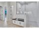 A modern bathroom shower featuring white subway tile, glass enclosure, and a granite bench at 36321 N 16Th St, Phoenix, AZ 85086