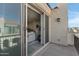 Balcony sliding door view of home interior, dining area, and exterior at 4020 E Toledo St # 103, Gilbert, AZ 85295
