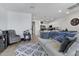 Well-lit living room featuring wood-style floors and a cozy seating area at 4020 E Toledo St # 103, Gilbert, AZ 85295