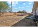 Spacious backyard includes a gazebo and block wall, providing privacy at 4020 W Tuckey Ln, Phoenix, AZ 85019