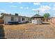 Backyard features a gazebo, patio area, and ample space for outdoor activities at 4020 W Tuckey Ln, Phoenix, AZ 85019