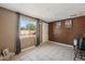 Versatile room with tiled flooring, a large window, and neutral walls, ready for personalization at 4020 W Tuckey Ln, Phoenix, AZ 85019