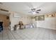 Spacious living area with neutral walls, tile flooring, and ample space for gatherings at 4020 W Tuckey Ln, Phoenix, AZ 85019