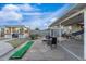 Relaxing backyard offering a built-in grill, comfortable seating, and a putting green for outdoor entertainment at 4245 N 16Th Dr, Phoenix, AZ 85015