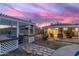 Inviting backyard with a covered patio, hot tub, and a pergola, ideal for outdoor entertaining and relaxation at 4245 N 16Th Dr, Phoenix, AZ 85015