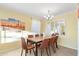Bright dining room features desert art, tile flooring, and pendant lighting at 4245 N 16Th Dr, Phoenix, AZ 85015