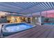 Inviting hot tub under a pergola, adjacent to an outdoor patio and backyard, perfect for relaxation at 4245 N 16Th Dr, Phoenix, AZ 85015