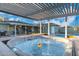 Enjoy the backyard hot tub on a wood deck, providing a relaxing retreat with a pergola and views at 4245 N 16Th Dr, Phoenix, AZ 85015
