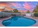 Refreshing pool with an inviting patio, outdoor seating, and lush landscaping for ultimate relaxation and entertainment at 4245 N 16Th Dr, Phoenix, AZ 85015