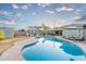 Expansive pool with a surrounding patio, gazebo, and comfortable seating, creating an outdoor oasis at 4245 N 16Th Dr, Phoenix, AZ 85015