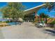 Community center featuring modern architecture, a scooter, and bike racks at 4434 E Camelback Rd # 132, Phoenix, AZ 85018