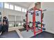 Bright home gym with weight rack, exercise equipment, and plenty of natural light, perfect for fitness enthusiasts at 4434 E Camelback Rd # 132, Phoenix, AZ 85018