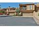 Beautiful townhome featuring a private patio, two-car garage, and stucco exterior at 4434 E Camelback Rd # 132, Phoenix, AZ 85018
