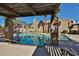 A community swimming pool featuring comfortable lounge chairs, offering a perfect spot for relaxation and recreation at 4434 E Camelback Rd # 132, Phoenix, AZ 85018