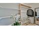 Bright walk-in closet with built-in shelves, hanging rack, and stylish decor, offering ample storage and organization at 4434 E Camelback Rd # 132, Phoenix, AZ 85018