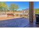 Expansive backyard with lush landscaping, seating, and picturesque mountain views at 6620 S Front Nine Dr, Gold Canyon, AZ 85118