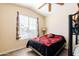 Bright bedroom with vaulted ceiling, a comfortable bed, and a window offering neighborhood views at 6620 S Front Nine Dr, Gold Canyon, AZ 85118