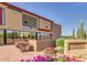 Mountain Brook Village Superstation Community Center with vibrant flower beds and desert landscaping at 6620 S Front Nine Dr, Gold Canyon, AZ 85118