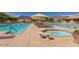 Community pools and lounge area with mountain views in background at 6620 S Front Nine Dr, Gold Canyon, AZ 85118
