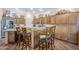 Spacious kitchen with granite countertops, wooden cabinets, and a large central island at 6620 S Front Nine Dr, Gold Canyon, AZ 85118