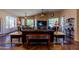Cozy living room with hardwood floors, great lighting, and a view to the backyard at 6620 S Front Nine Dr, Gold Canyon, AZ 85118
