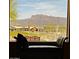 Enjoy picturesque window views of the mountain and desert landscape from the comfort of home at 6620 S Front Nine Dr, Gold Canyon, AZ 85118