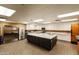 Spacious kitchen with stainless steel appliances, white cabinetry, and a large center island at 7304 E Northridge Cir, Mesa, AZ 85207