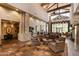 Grand lobby featuring soaring ceilings, stone accents, and inviting seating arrangements at 7304 E Northridge Cir, Mesa, AZ 85207