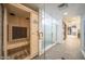 Sauna and shower area featuring glass doors and modern fixtures in light, clean space at 7304 E Northridge Cir, Mesa, AZ 85207