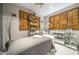 Relaxing spa room with adjustable shutters, treatment bed, and modern equipment at 7304 E Northridge Cir, Mesa, AZ 85207
