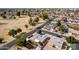 Aerial view of the home in a residential neighborhood with tree-lined streets and convenient access to local amenities at 7309 E Diamond Ave, Mesa, AZ 85208