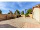Backyard featuring a pea gravel area and a wooden swing set at 7309 E Diamond Ave, Mesa, AZ 85208