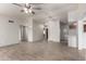 Open living area with tile flooring, ample natural light, and a view to the kitchen at 7309 E Diamond Ave, Mesa, AZ 85208