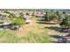 Expansive community park with a playground, picnic area, and a large grassy field, perfect for outdoor activities and events at 741 W Harvard Ave, Gilbert, AZ 85233