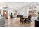 This dining area is open to the living room with a large picture window and pendant lighting at 741 W Harvard Ave, Gilbert, AZ 85233