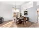 This dining area is well-lit and includes a decorative chandelier and laminate floors at 741 W Harvard Ave, Gilbert, AZ 85233
