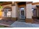 The front entry features decorative security door, and a large picture window for natural light at 741 W Harvard Ave, Gilbert, AZ 85233