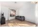 Bright living room features wood floors and large windows at 741 W Harvard Ave, Gilbert, AZ 85233