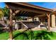 Outdoor kitchen area with built-in grill and ample counter space for entertaining at 741 W Harvard Ave, Gilbert, AZ 85233