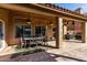 Large covered patio perfect for outdoor entertaining, featuring a dining area and BBQ at 741 W Harvard Ave, Gilbert, AZ 85233