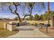 Neighborhood picnic area with tables, benches, BBQ grill, and shaded area for outdoor gatherings and community events at 741 W Harvard Ave, Gilbert, AZ 85233
