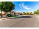 This single story home has desert landscaping, a three car garage and a tile roof at 741 W Harvard Ave, Gilbert, AZ 85233