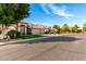 This single story home has desert landscaping, a three car garage and a tile roof at 741 W Harvard Ave, Gilbert, AZ 85233